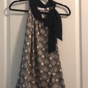 Tan with black bow tie